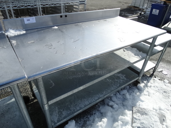 Stainless Steel Commercial Table w/ 2 Metal Undershelves on Commercial Casters. 60x30x41