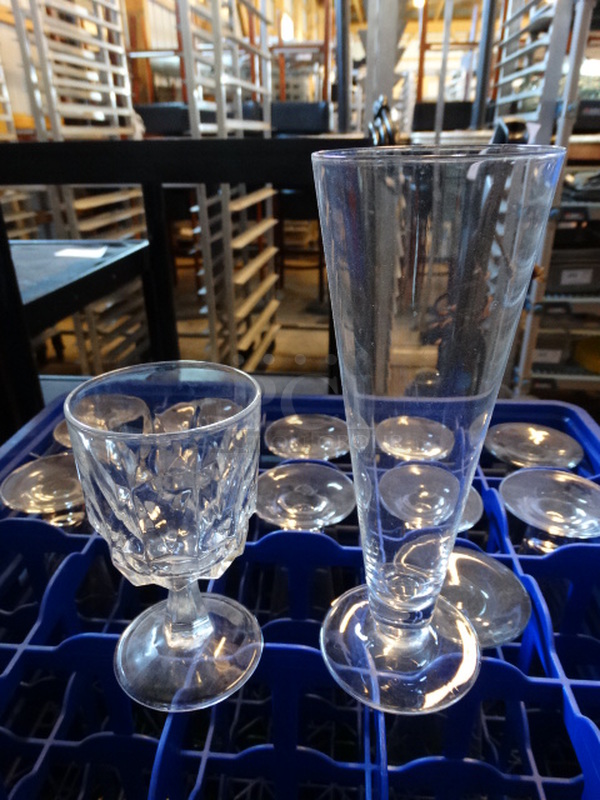 19 Various Glasses; Footed Glasses and Wine Glasses in Dish Caddy. Includes 3x3x9. 19 Times Your Bid!