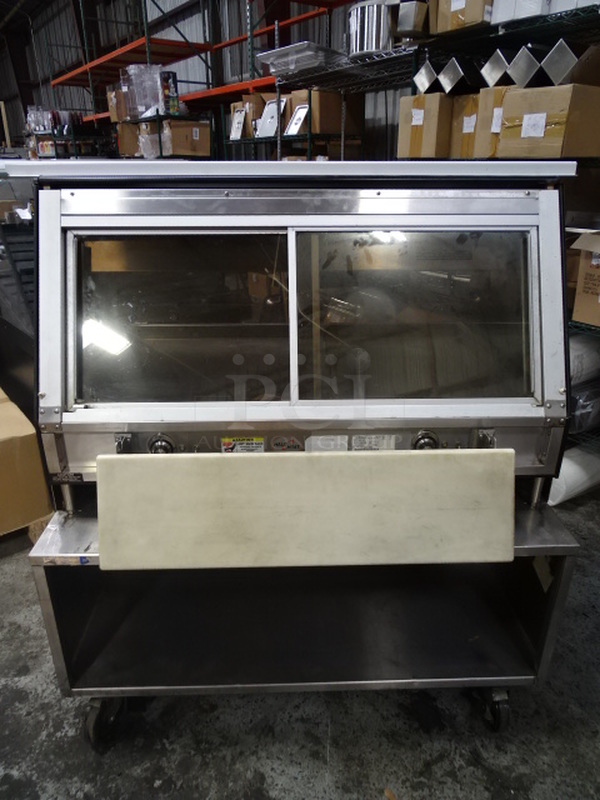 WOAH! Alto-Shaam ED2-48/P 48" Heated Countertop Display Case With Commercial Stainless Steel Table On Commercial Casters. 120/208-240 Volt 1 Phase. 48.5x40x53