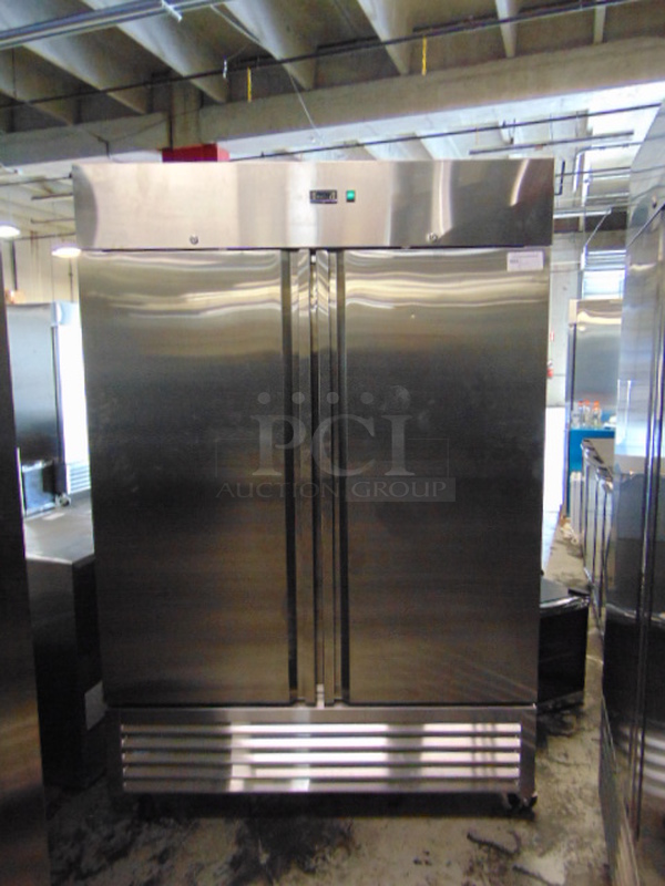 BEAUTIFUL! BRAND NEW SG Merchandising Model DD49-SDSS Commercial Stainless Steel Electric Double Door Freezer On Commercial Casters. 115 Volt 54.25x32.25x83 Tested And Working. 