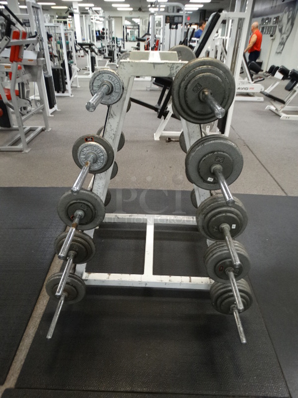 ALL ONE MONEY! Lot of White Metal Olympic Weight Bar Tree w/ 10 Bars Included In Picture! Bar Weights: 20 Pounds, 30 Pounds, 40 Pounds, 50 Pounds, 60 Pounds, 70 Pounds, 80 Pounds, 90 Pounds, 100 Pounds and 110 Pounds. 28x40x49. 60" Bars