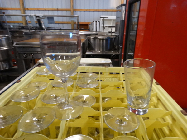 23 Various Glasses in Dish Caddy. Includes 2.5x2.5x7, 2.5x2.5x5. 23 Times Your Bid!