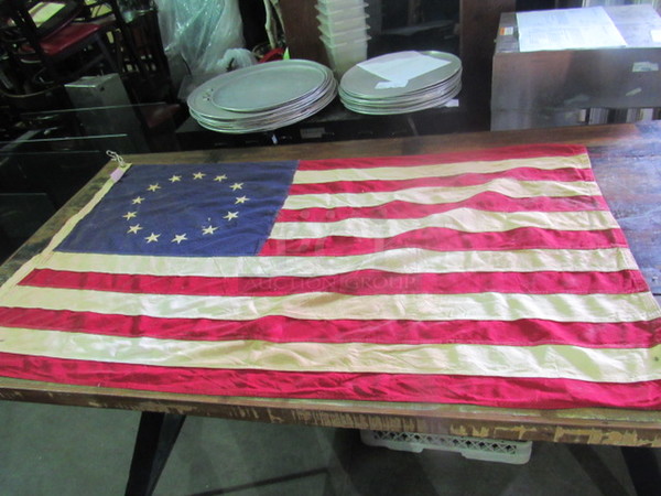 One 54X30 American Flag With 13 Stars.