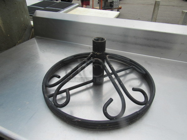 One Metal Umbrella Stand.