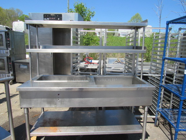 One Stainless Steel Work Station With 2 SS Over Shelves, SS Under Shelf, One Ice Well And 1 Heated Well.