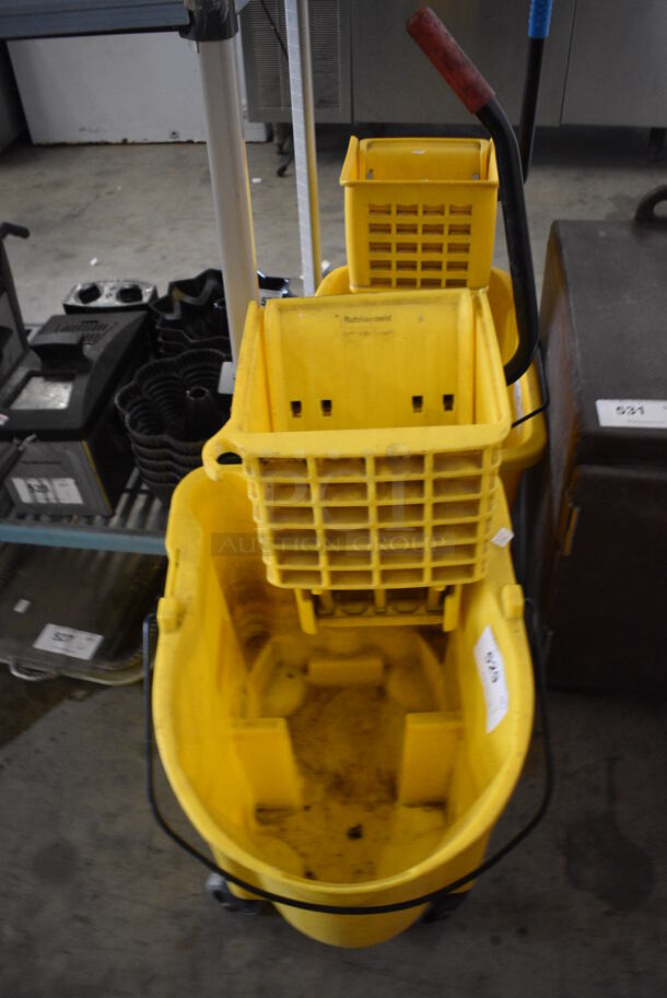Yellow Poly Mop Bucket w/ Wringing Attachment on Casters. 16x22x36