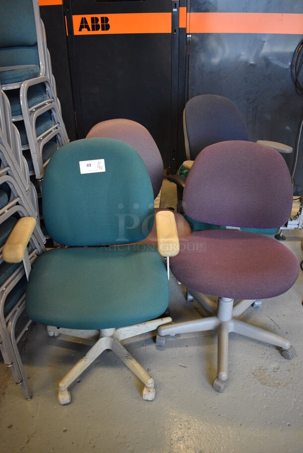 4 Various Office Chairs on Casters. Includes 24x18x37. 4 Times Your Bid! (Midtown 1: Room 122)