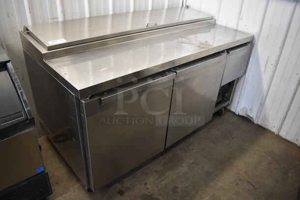 NICE! Continental Model CPA68 Stainless Steel Commercial Pizza Prep Table on Commercial Casters. 115 Volts, 1 Phase. 68x35x40. Tested and Powers On But Does Not Get Cold