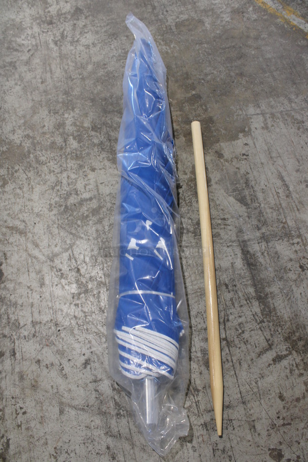2 Panama Jack Blue Patio Umbrellas w/ 4 Wooden Posts. 55" Umbrella, 40" Posts. 2 Times Your Bid!