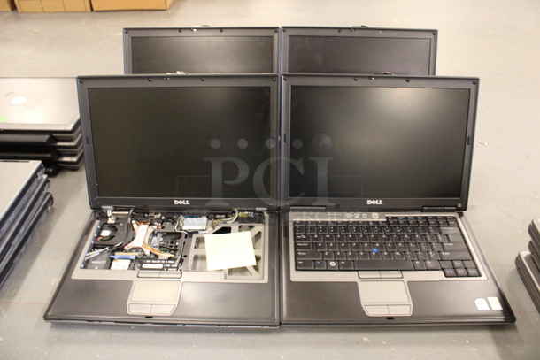 4 Dell Model PP18L Latitude D620/D630 14" Laptops. 4 Times Your Bid! (Basement: Room 019)