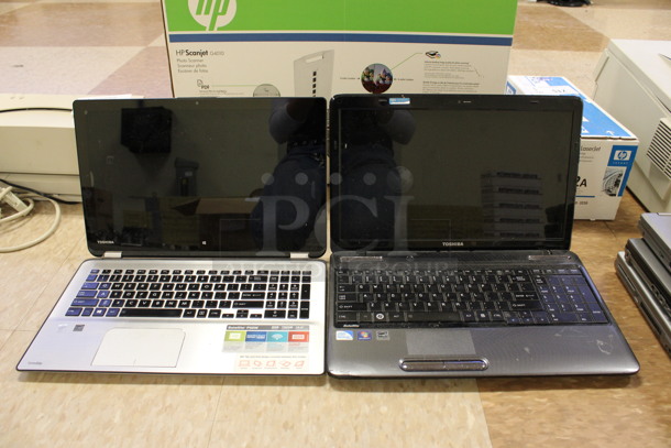 2 Various Toshiba Laptops Including Model PSJ2UU-003001. 15.5". 2 Times Your Bid! (Room 108)
