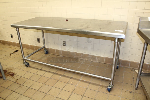 Stainless Steel Table On Casters. 70x30x34
