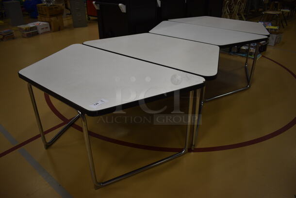4 White Tables on Metal Frame. 58x30x27. 4 Times Your Bid! (Chipperfield Elementary Gym)