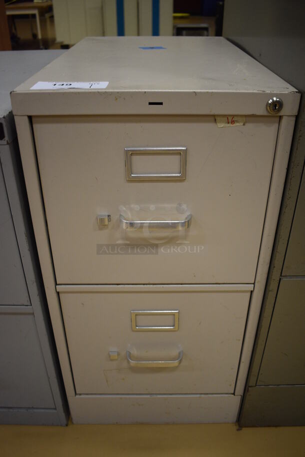 Tan Metal 2 Drawer Filing Cabinet. 15x27x28. (Chipperfield Elementary Gym)