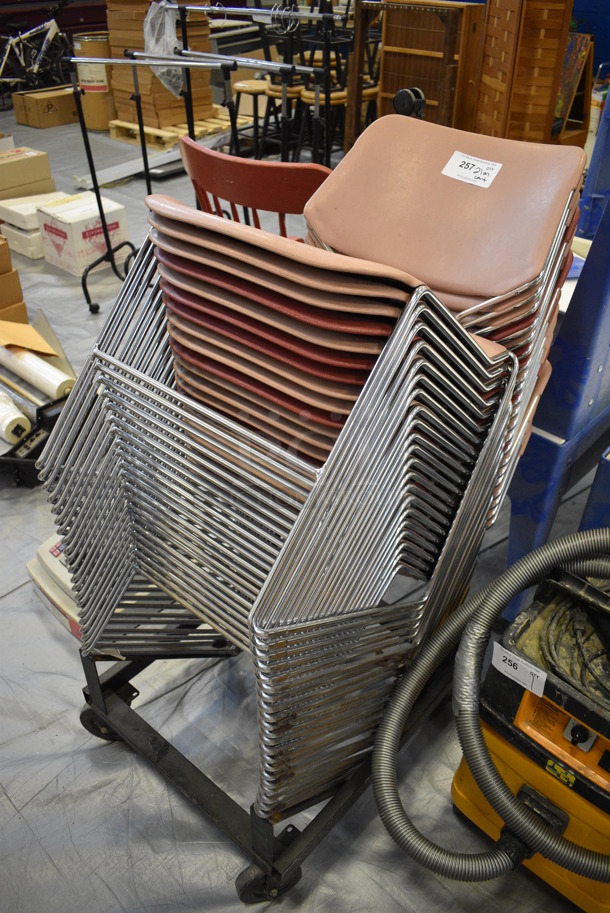 21 Poly Chairs on Metal Legs w/ Metal Cart. 18x20x32. 21 Times Your Bid! (Middle School Gym)
