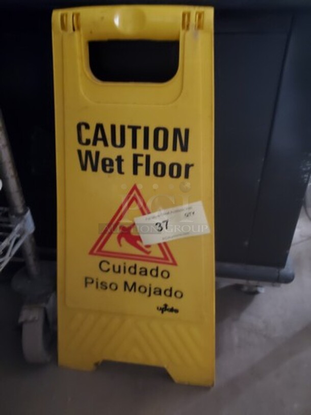 "CAUTION" Floor sign
