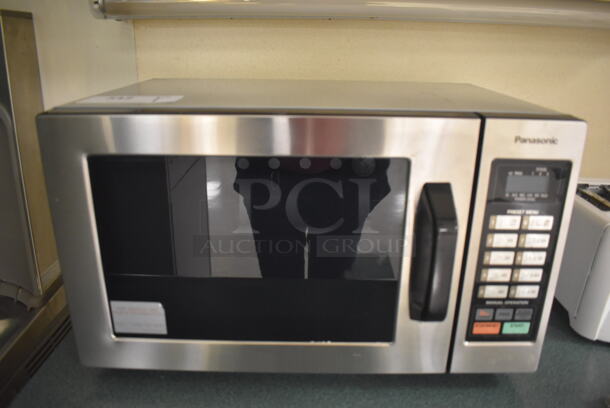 2014 Panasonic NE-1054F Stainless Steel Commercial Countertop Microwave Oven. 120 Volts, 1 Phase. 20x15x12. Tested and Working! (Student Lounge)