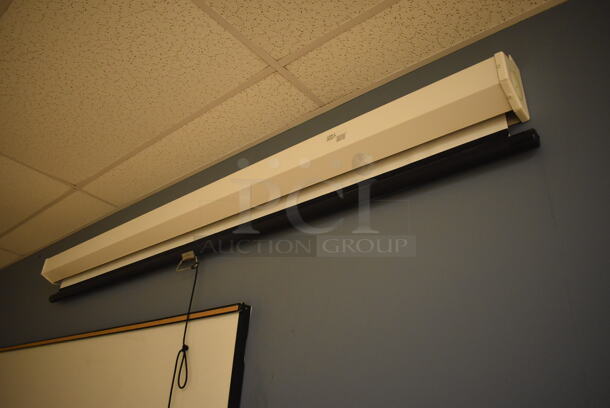 Epson Ceiling Mounted Projector and Pull Down Projection Screen. BUYER MUST REMOVE. 11x8x4, 94". (Classroom 1)