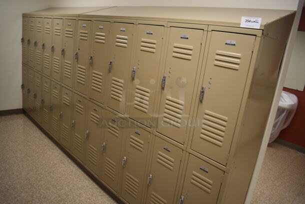 Wall of 24 Tan Metal Lockers. BUYER MUST REMOVE. 145x18x71. (Mens Locker Room)