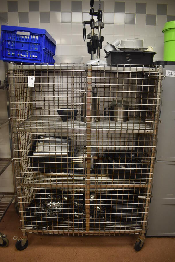 Metal 4 Tier Wire Shelving Unit w/ Liquor Cage on Commercial Casters. Comes w/ Contents Including Utensils, Toaster and Pitcher.  BUYER MUST DISMANTLE. PCI CANNOT DISMANTLE FOR SHIPPING. PLEASE CONSIDER FREIGHT CHARGES. 48x24x70. (Dishroom)
