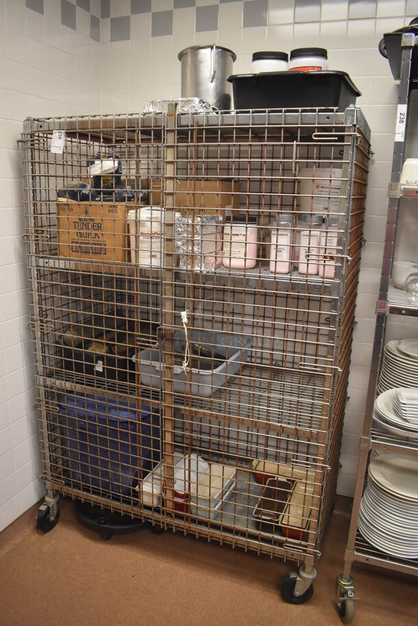 Metal 4 Tier Wire Shelving Unit w/ Liquor Cage on Commercial Casters. Comes w/ Contents Including Tender Quick and Fermento. BUYER MUST DISMANTLE. PCI CANNOT DISMANTLE FOR SHIPPING. PLEASE CONSIDER FREIGHT CHARGES. 48x24x70. (Dishroom)