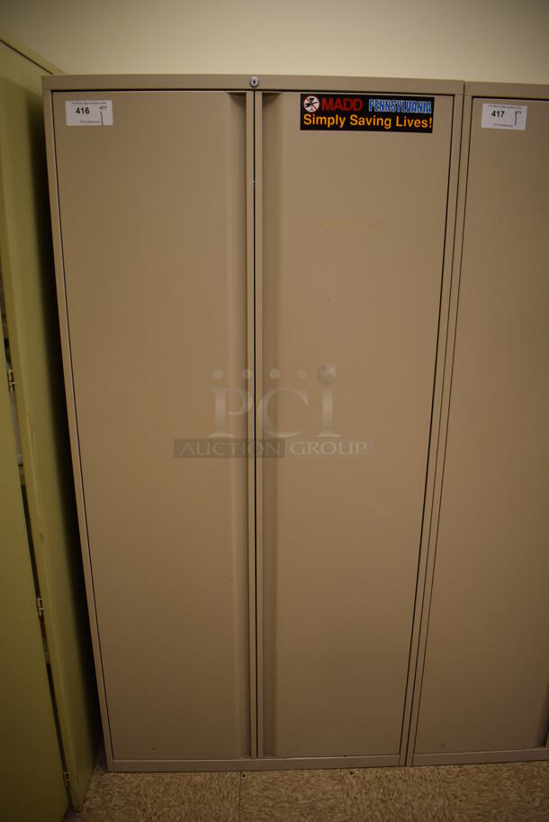 Tan Metal 2 Door Cabinet w/ Contents. 36x18x75. (EMT/Forensics Lab)
