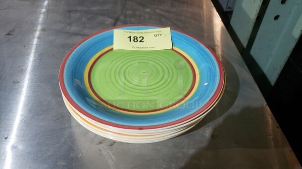 Lot of 7 Colorful Dinner Plates. 10.5" plates. 1 plate has a small chip.
