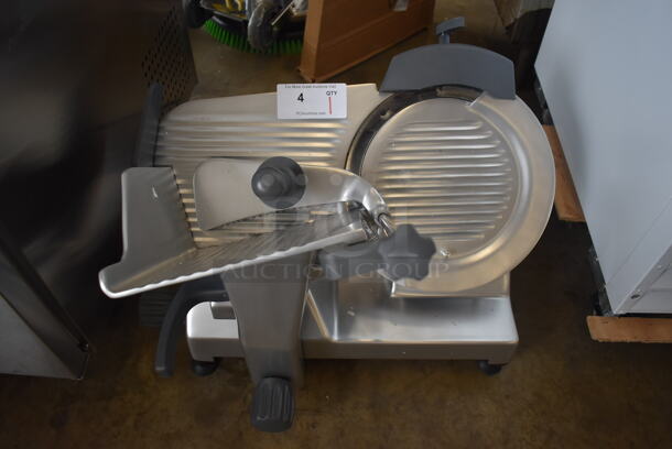 BRAND NEW SCRATCH AND DENT! Hobart Centerline EDGE12-11 Stainless Steel Commercial Countertop 12" Manual Meat Slicer w/ Blade Sharpener. 115 Volts, 1 Phase. 26x22x22. Tested and Working!