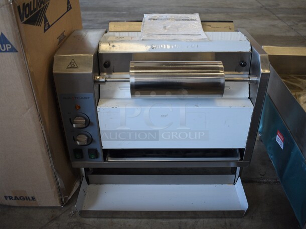 LIKE NEW! AvaToast 184BT18A Stainless Steel Commercial Countertop Vertical Contact Conveyor Bun Toaster. Unit Has Only Been Used a Few Times! 120 Volts, 1 Phase. 25x19x21. Tested and Working!