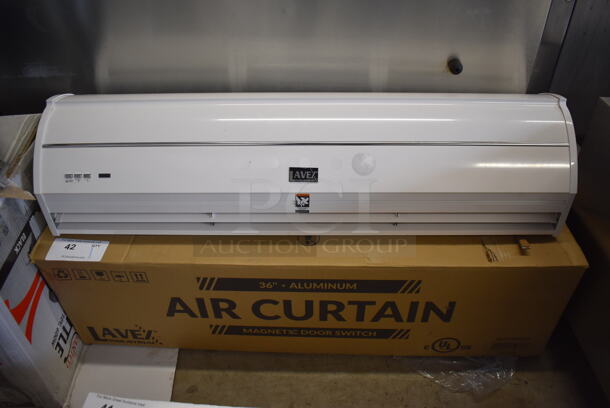 BRAND NEW IN BOX! Lavex Industrial 687FM3509LY 36" Aluminum Air Curtain with Remote Magnetic Door Switch. 120 Volts, 1 Phase. 36x10x9. Tested and Working!