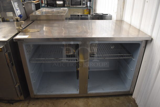 Delfield Undercounter Cooler With Metal Shelves. Missing Doors. 115 Volts 1 Phase Tested and Powers On But Does Not Get Cold