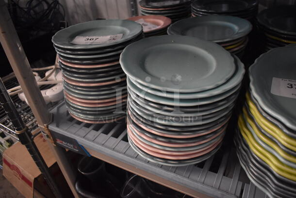 37 Multi Colored Homer Laughlin Pastel Plates. 37 Times Your Bid!