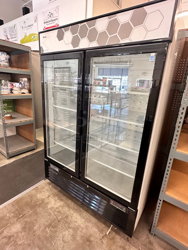 Late Model Migali C-49FM-HCe 54 inch Two Section Glass Door Merchandiser Freezer 115 Volt Working