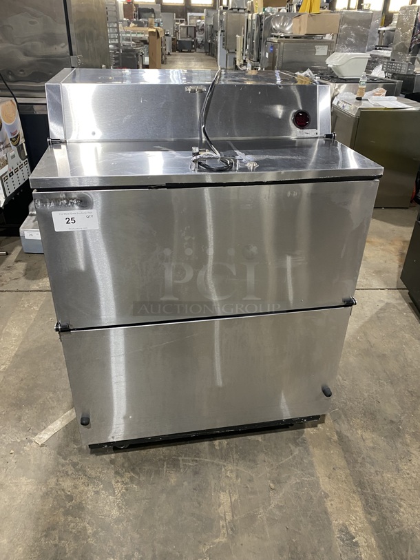 True Stainless Steel Commercial Milk Cooler on Commercial Casters! Eletric Powered! MODEL: TMC-34-S SN:1-4828353 115 Volts, 1 Phase! 