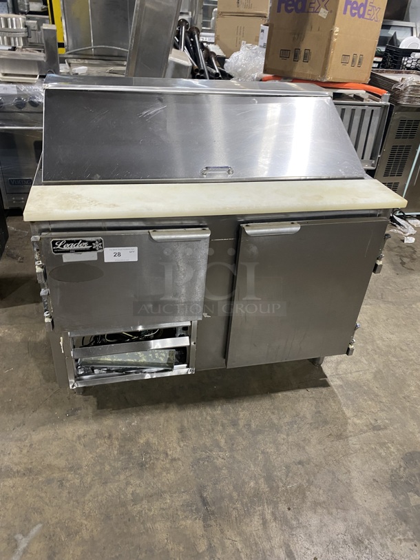 Leader Commercial Refrigerated Sandwich/Salad Prep Table! With Commercial Cutting Board! With 2 Door Underneath Storage Space! All Stainless Steel! Model: LM48S/C SN:PW02C1829! 115V 1 Phase! On Legs!