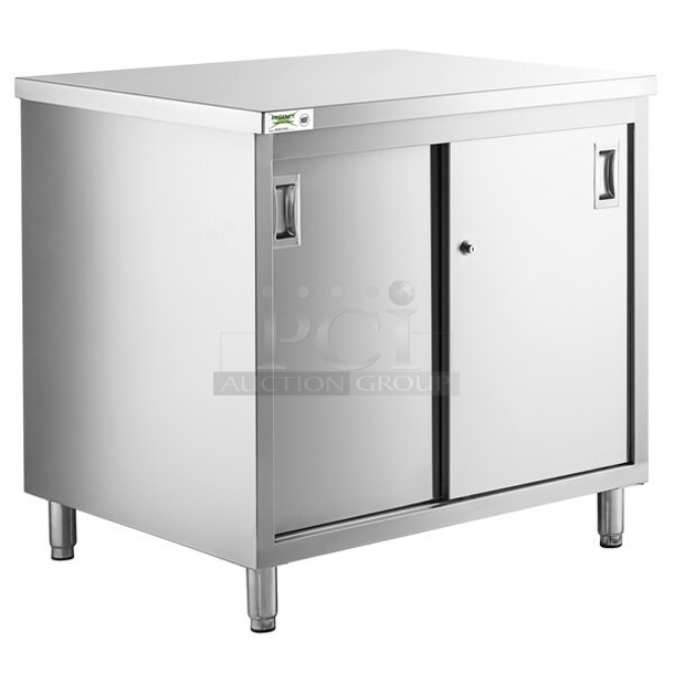 BRAND NEW SCRATCH AND DENT! Regency 600EBT3036D Stainless Steel Commercial  30" x 36" 16 Gauge Enclosed Base Table with Sliding Doors and Adjustable Midshelf