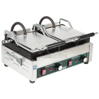 BRAND NEW SCRATCH AND DENT! 2024 Waring WFG300 Stainless Steel Commercial Tostato Ottimo Smooth Top & Bottom Dual Panini Sandwich Grill - 17" x 9 1/4" Cooking Surface. 240 Volts, 1 Phase. 