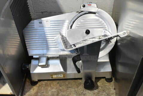 Berkel 827A Stainless Steel Commercial Countertop Meat Slicer w/ Blade Sharpener. 115 Volts, 1 Phase. Tested and Powers On But Parts Do Not Move