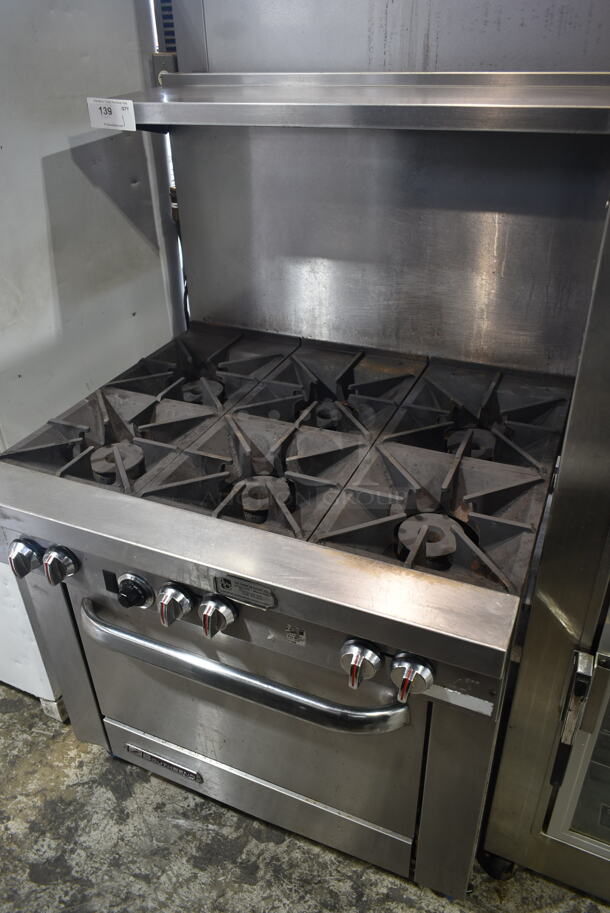 Southbend S36D Stainless Steel Commercial Natural Gas Powered 6 Burner Range w/ Oven, Over Shelf and Back Splash. 