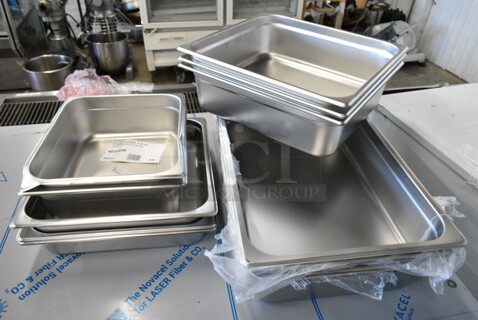 11 BRAND NEW SCRATCH AND DENT! Stainless Steel Drop In Bins Including 2 4070249 Choice 1/2 Size 4" Deep Anti-Jam Stainless Steel Steam Table / Hotel Pan - 24 Gauge, 3 4070122 Choice 2/3 Size 2 1/2" Deep Anti-Jam Stainless Steel Steam Table / Hotel Pan - 24 Gauge, 3 4070142 Choice 2/3 Size 4" Deep Anti-Jam Stainless Steel Steam Table / Hotel Pan - 24 Gauge, 4 4070049 Choice Full Size 4" Deep 24 Gauge Anti-Jam Stainless Steel Steam Table / Hotel Pan. 11 Times Your Bid! 