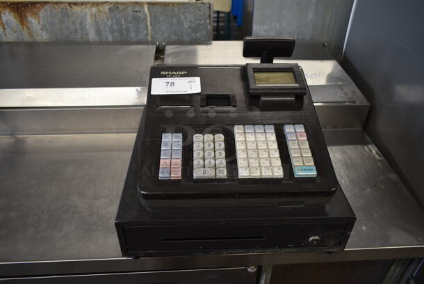 Sharp XE-A407 Countertop Electronic Cash Register. 120 Volts, 1 Phase. 