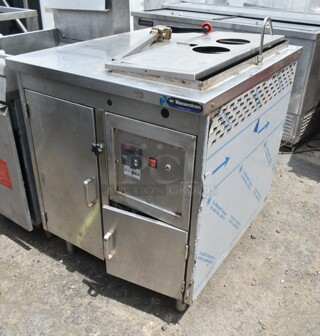 Wasserstrom R/T F639-03-57 Stainless Steel Commercial Work Station w/ Well and Commercial Can Opener. 208 Volts, 1 Phase. 