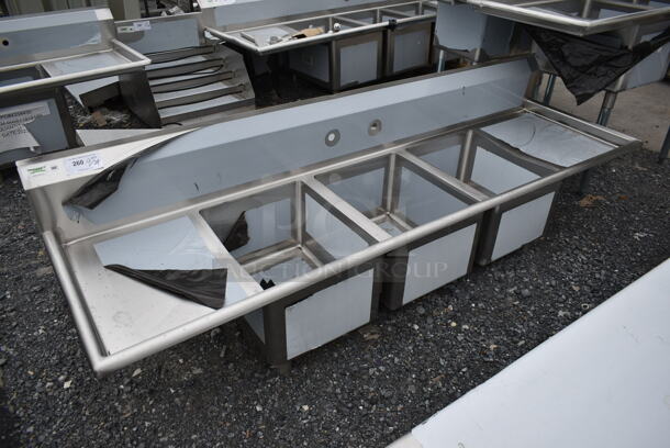 BRAND NEW SCRATCH AND DENT! Regency 600S31620218 Stainless Steel Commercial 3 Bay Sink w/ Dual Drain Boards. No Legs.