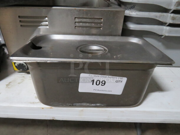 One 1/3 Size 6 Inch Deep Hotel Pan With Lid.