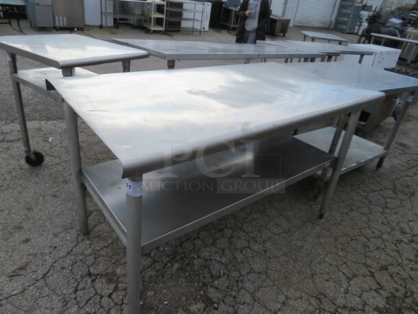 One Stainless Steel Table With Stainless Steel  Under Shelf. 60X32X34