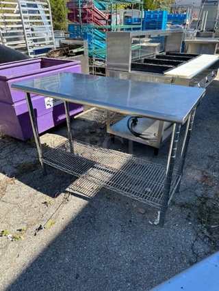 One Stainless Steel Table With A Metro Under Shelf. 49.5X24X34