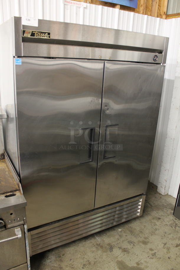 2011 True T-49F-HC Stainless Steel Commercial 2 Door Reach In Freezer w/ Poly Coated Racks on Commercial Casters. 115 Volts, 1 Phase. Tested and Working!