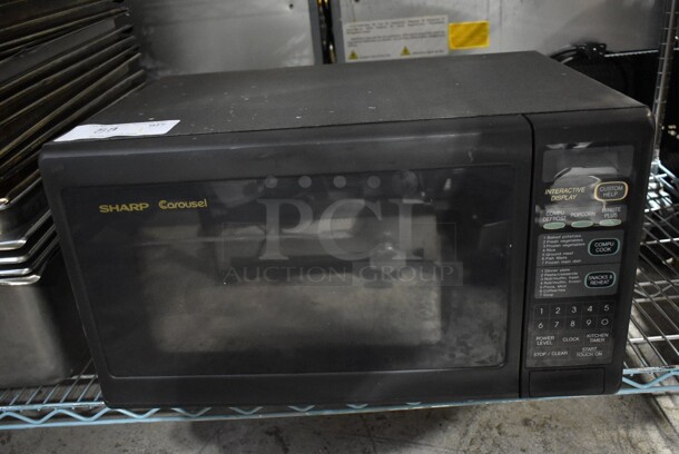 Sharp R-3A88 Countertop Microwave Oven w/ Plate. 120 Volts, 1 Phase. 