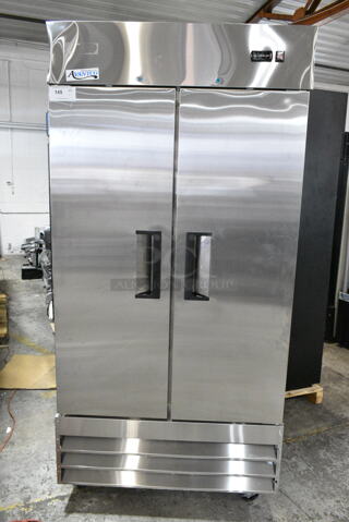 BRAND NEW SCRATCH AND DENT! 2024 Avantco 178A35FHC Stainless Steel Commercial 2 Door Reach In Cooler w/ Poly Coated Racks on Commercial Casters. 115 Volts, 1 Phase. 