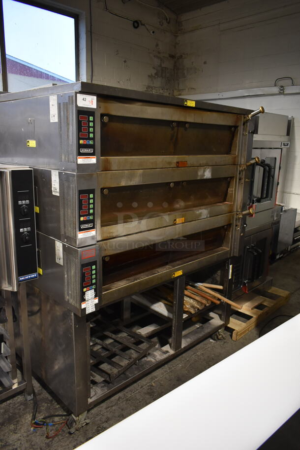 3 2013 Hobart OV400W-3 Stainless Steel Commercial Electric Powered Triple Deck Bakery Oven on Pan Rack w/ Commercial Casters. 208 Volts, 3 Phase. 3 Times Your Bid!